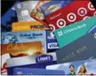  ?? KEITH SRAKOCIC — THE ASSOCIATED PRESS FILE PHOTO ?? Credit cards that are affiliated with brands are suddenly amping up rewards for everyday purchases at restaurant­s, gas stations and grocery stores.