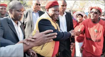  ?? PICTURE: OUPA MOKOENA ?? DETERMINED: EFF leader Julius Malema leaves Marikana police station after laying charges against Deputy President Cyril Ramaphosa, senior cabinet ministers and Lonmin yesterday.