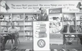  ??  ?? Hopson announces the alliance at Dunbar Elementary in Orange Mound. The effort is being coordinate­d by Shepherdin­g the Next Generation, a Washington-based nonprofit group working in nine states to get people of faith involved in schools. The...