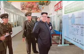  ?? REUTERS PIC ?? Kim Jong-un visiting the Chemical Material Institute of the Academy of Defence Science in Pyongyang.