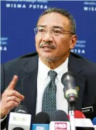  ??  ?? Their say: Hishammudd­in and Khairy are firm in their stance about not giving support to Anwar to be the country’s leader.