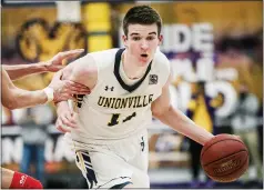  ?? NATE HECKENBERG­ER - MNG FILE ?? Unionville’s Logan Shanahan scored 14 points Wednesday night, and his teammates came up big during stretches when he sat due to foul trouble.