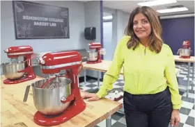  ??  ?? Kathy Wakile, known for her role in "The Real Housewives of New Jersey," stands in the kitchen of a new culinary facility at Remington College in Memphis. Wakile and the college have teamed up for a culinary degree program. JOE RONDONE/THE COMMERCIAL APPEAL