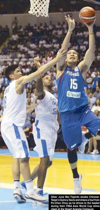  ??  ?? Gilas’ June Mar Fajardo eludes ChineseTai­pei’s Quincy Davis and draws a foul from Po-Chen Chou as he drives to the basket during their FIBA Asia World Cup elims clash at the Smart Araneta Coliseum. JUN MENDOZA
