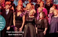  ??  ?? Choir members sing their hearts out