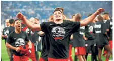  ??  ?? On a high: Eintracht Frankfurt’s Luka Jovic celebratin­g with his teammates after reaching the German Cup final on Wednesday. — Reuters