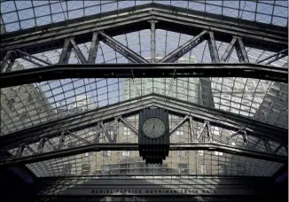  ?? SETH WENIG-ASSOCIATED PRESS ?? The Moynihan Train Hall is seen during a media preview in New York, Wednesday, Dec. 30, 2020. The $1.6billion project replacing Manhattan’s cramped and dark Penn Station with a light-filled train hall is set for completion this week, with the first trains rolling out on New Year’s Day. The new 255,000-square-foot station is named after U.S. Sen. Daniel Patrick Moynihan, a Democrat who championed the project and died in 2003.