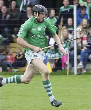  ??  ?? St. James’ best forward, Kevin O’Grady, on the move towards the Fethard goal.