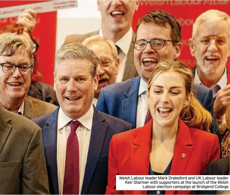  ?? ?? Welsh Labour leader Mark Drakeford and UK Labour leader Keir Starmer with supporters at the launch of the Welsh Labour election campaign at Bridgend College