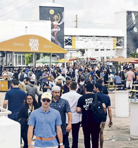  ?? Alfonso Duran, © The New York Times Co. ?? Attendees enter the grounds for Bitcoin 2021 this month in Miami. It was the largest Bitcoin event in the world and the first major in-person crypto conference since the pandemic started.