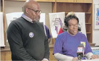  ?? MITCH DUDEK/SUN-TIMES ?? SEIU Local 73 President Dian Palmer and Vice President Jeffrey Howard announce on Monday a tentative contract agreement with Chicago Public Schools.