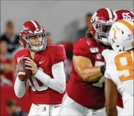  ?? KEVIN C. COX / GETTY IMAGES ?? Alabama quarterbac­k MacJones entered against Tennessee on Saturday with about six minutes remaining in the second quarter and finished 6-of-11 passing for 72 yards in the top-ranked Crimson Tide’s win.