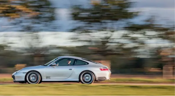  ??  ?? Above 996 Turbo trappings make the 996 Carrera 4S look arguably more aggressive than the later 997 carrying the same nameplate