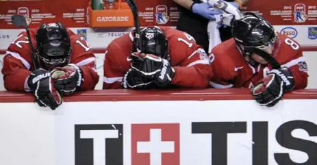  ?? NATHAN DENETTE/THE CANADIAN PRESS ?? Canadian forwards Brendan Gallagher, Brett Connolly and captain Jaden Schwartz in the final minute of Tuesday night’s semifinal loss to Russia.