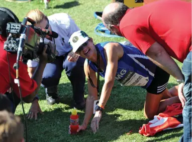  ??  ?? UPS AND DOWNS: Caroline Wostmann finishes second in the 2016 Comrades Marathon from Pietermari­tzburg to Durban.