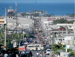  ?? GETTY IMAGES ?? Oxfam was part of a massive internatio­nal relief effort in Port-auPrince but their presence has been shaken by claims of sexual exploitati­on.