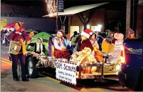  ?? Westside Eagle Obseerver/RANDY MOLL ?? The Girl Scouts of Gentry, Decatur and Siloam Springs were represente­d by this float in The Gentry Christmas Parade.