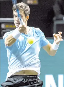  ?? - AFP photo ?? Aljaz Bedene from Slovenia returns a ball to Stefanos Tsitsipas from Greece on the fourth day of the ABN AMRO World Tennis Tournament in Rotterdam, Netherland­s.