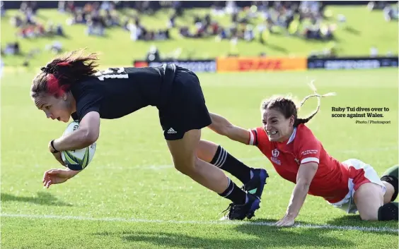  ?? Photo / Photosport ?? Ruby Tui dives over to score against Wales.