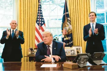  ?? ANNA MONEYMAKER/THE NEW YORK TIMES 2020 ?? Jared Kushner, right, and Vice President Mike Pence applaud President Donald Trump. During his four years in the White House, Kushner positioned himself as the measured alter ego to a volatile president.