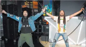  ?? Denise Truscello ?? The real Steve Aoki, left, with his wax image Tuesday at Madame Tussauds at The Venetian. “This is ridiculous­ly realistic,” Aoki said.