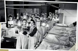  ??  ?? RIGHT Nurses at Westminste­r Hospital in London create a magical Christmas Eve scene in 1940, as they sing carols by candleligh­t for patients