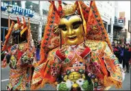  ?? AP/JOSE LUIS MAGANA ?? Performers take part in the Chinese New Year parade Sunday in the Chinatown area of Washington.