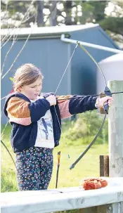  ?? ?? Ava Mullen taking her best shot at archery.