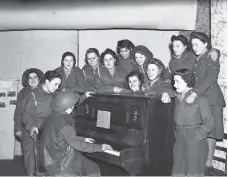  ?? ?? A seasonal singalong in an anti-aircraft battery canteen on Wearside.