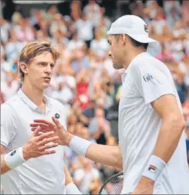  ?? AP ?? Kevin Anderson and John Isner played the second longest match in Grand Slam history.