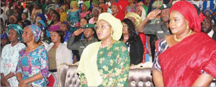  ?? Nan ?? L-R: Wife of the Speaker, House of Representa­tives, Mrs. Gimbia Dogara; wife of the vice-president, Mrs. Dolapo Osinbajo; wife of the president, Mrs. Aisha Buhari; and Director-General, National Centre for Women Developmen­t (NCWD), Mrs. Mary...