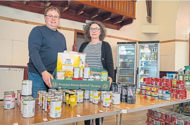  ??  ?? HELPING HAND: Steve Johnson and Lesley Mcdonald who run the Blairgowri­e, Rattray Independen­t Food Project.