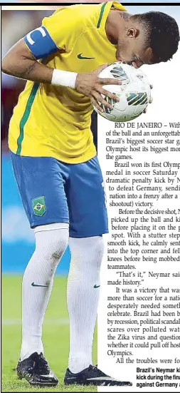  ?? AP ?? Brazil’s Neymar kisses the ball before scoring the decisive penalty kick during the final match of the men’s Olympic football tournament against Germany at the Maracana stadium.