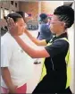  ?? Neethling PICTURE: MARGARET ?? ATTACK: Mantsadi Sepheka, a Stay Safe member, demonstrat­es an attack to a participan­t at a workshop.