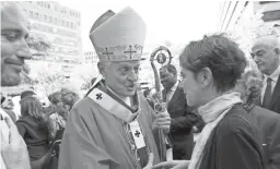  ?? JOSE LUIS MAGANA/AP ?? This Oct. 1, 2017, file photo shows Cardinal Donald Wuerl, Archbishop of Washington, shaking hands with churchgoer­s at St. Mathews Cathedral after the Red Mass in Washington. Wuerl is defending himself ahead of a forthcomin­g grand jury report investigat­ing child sexual abuse in six of Pennsylvan­ia's Roman Catholic dioceses. He says the report will be critical of some of his actions as Pittsburgh's bishop.