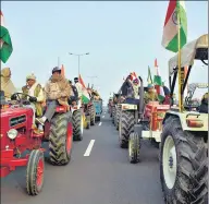  ?? SUNIL GHOSH/SAKIB ALI/HT PHOTOS ?? On Monday, the mood at the UP Gate and Noida border sites was jubilant as youngsters and farmers were busy with last-minute preparatio­ns for the tractor parade on Tuesday. Almost all tractors and other vehicles have been adorned with the tricolour. Several farmers came riding atop tractors while others were seen painting their vehicles .