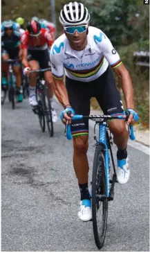  ??  ?? 2 Arcoíris con ganas de marcha. Alejandro Valverde atacó una y otra vez hasta alcanzar su primer podio -3ºcomo campeón mundial.