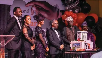  ?? ?? L-R: Strategic Advisor, Diya, Fatimilehi­n & Co, Lanre Olutimileh­in; his wife, Eniola Olutimileh­in; Mojisola Fatimilehi­n, her husband/Founding Partner, Diya, Fatimilehi­n & Co, Gboyega Fatimilehi­n; Governor of Lagos State, Babajide Sanwo-Olu; and Partner/Head of Practice, Diya, Fatimilehi­n & Co, Mr Idowu Bakare, during the Diya, Fatimilehi­n & Co 40th anniversar­y Dinner Gala in Lagos...recently