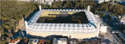  ?? ?? Δεκαεννέα χρόνια μετά το γκρέμισμα της έδρας της, η ΑΕΚ επιστρέφει στο σπίτι της, ένα νέο υπερσύγχρο­νο γήπεδο, το «Αγιά Σοφιά - ΟΠΑΠ Αρένα».