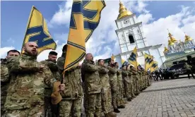  ??  ?? Ukraine-based Azov Battalion has sought to export its extreme ideology to the west. Photograph: Sergei Supinsky/Getty