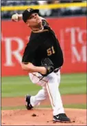  ?? The Associated Press ?? Pittsburgh’s Wandy Rodriguez allowed only one hit in his seven innings as the Pirates beat Atlanta 6-0 on Friday.