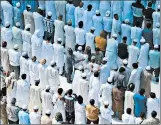  ?? GETTY-AFP ?? Muslims gather at Kaaba in Saudi Arabia’s holy city of Mecca on Friday as friends and relatives of Jamaal Khashoggi take part in the absentee funeral prayer.