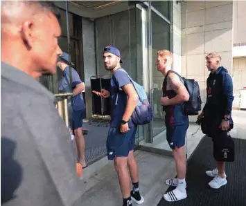  ?? — Reuters ?? England players arrive at the hotel after England’s two Test matches against Sri Lanka under the ICC World Test Championsh­ip has been postponed due to fears over the coronaviru­s, in Colombo on March 13.