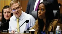  ?? CAROLYN KASTER/AP ?? Chairman Jim Jordan, R-ohio (left), speaks as Del. Stacey Plaskett, D-virgin Islands, listens during a House Judiciary subcommitt­ee hearing on what Republican­s say is the politiciza­tion of the FBI and Justice Department.