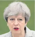  ??  ?? Under pressure: Theresa May