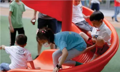  ?? Photograph: Aly Song/Reuters ?? ‘Beijing is scrambling to persuade people to have more children.’