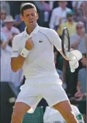  ?? ?? The Associated Press
Serbia’s Novak Djokovic celebrates after beating Britain’s Cameron Norrie to advance to the Wimbledon men’s final.