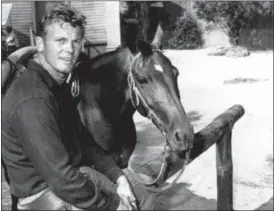  ?? THE ASSOCIATED PRESS FILE ?? Actor Tab Hunter, the blond actor and singer who was the heartthrob of millions of teenage girls in the 1950s, and received new attention decades later when he revealed that he was gay, died Sunday. He was 86.