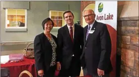  ?? KEVIN MARTIN — THE MORNING JOURNAL ?? Mary Krupar, Ted Esborn and Gregory Zilka stand in front of the City of Avon Lake booth on April 27 at the fifth annual North Coast Business Expo at Sprenger’s Main Street Care Center at 500 Community Drive. The Expo showcased nearly 50 local...