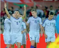  ?? — Photo by M. Sajjad ?? Odil Akhmedov celebrates his goal against Oman at the Sharjah Stadium on Wednesday.